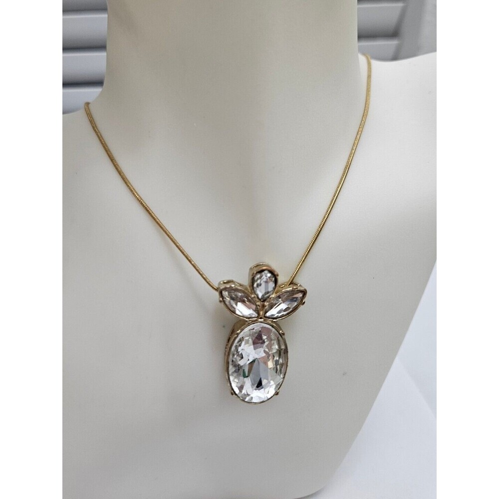 Vintage Golden Tone Metal Large Pear Shaped Rhinestone Bow Pendant Necklace.